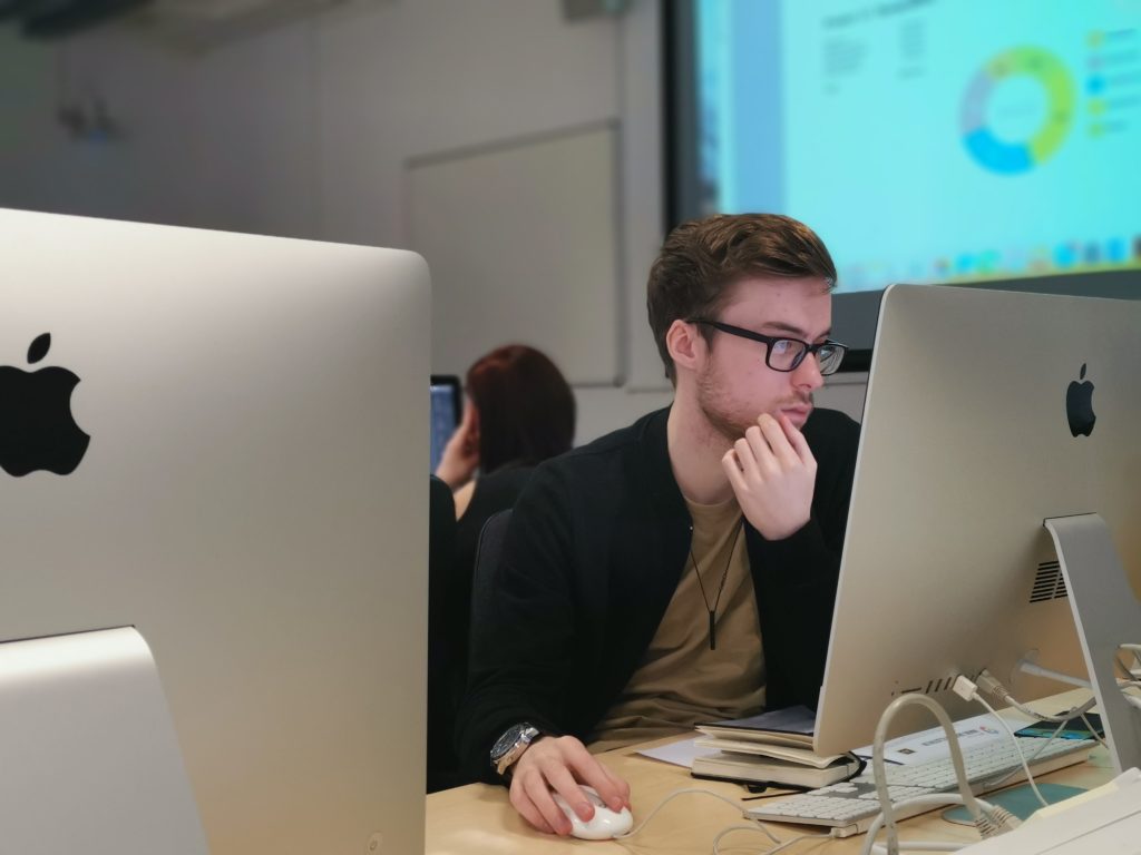 First-year student Jordan, fully-focused during a software workshop in the WLV GD Mac Lab 